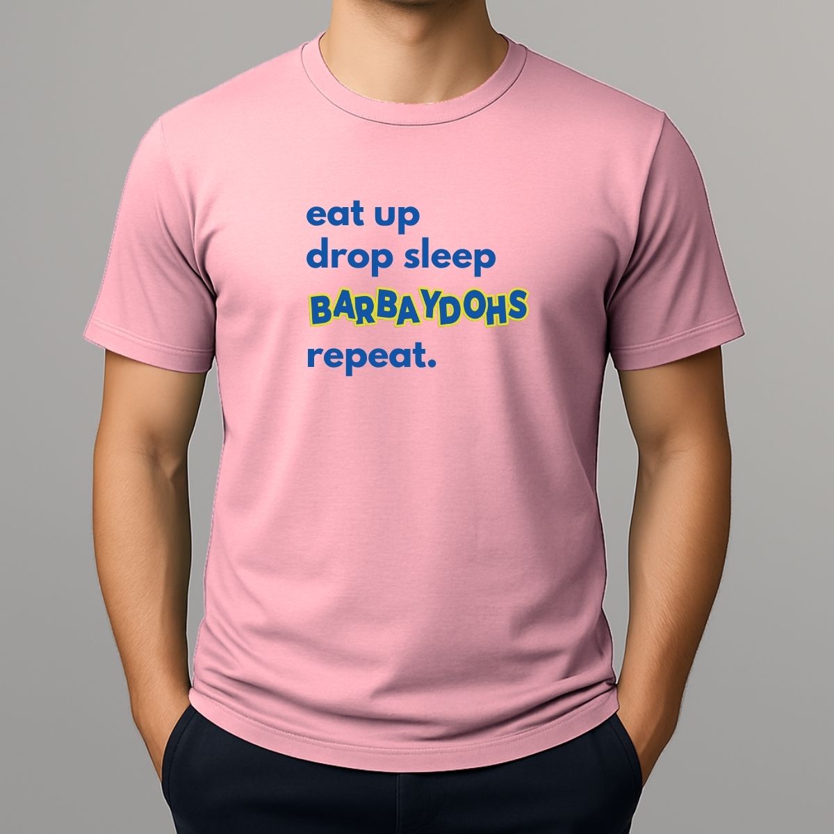 Person wearing a pink t-shirt with text 'eat up drop sleep BARBAYDOHS repeat.'