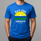 Person wearing a blue t-shirt with 'BAY-JUN AIRWAYS' design on a gray background