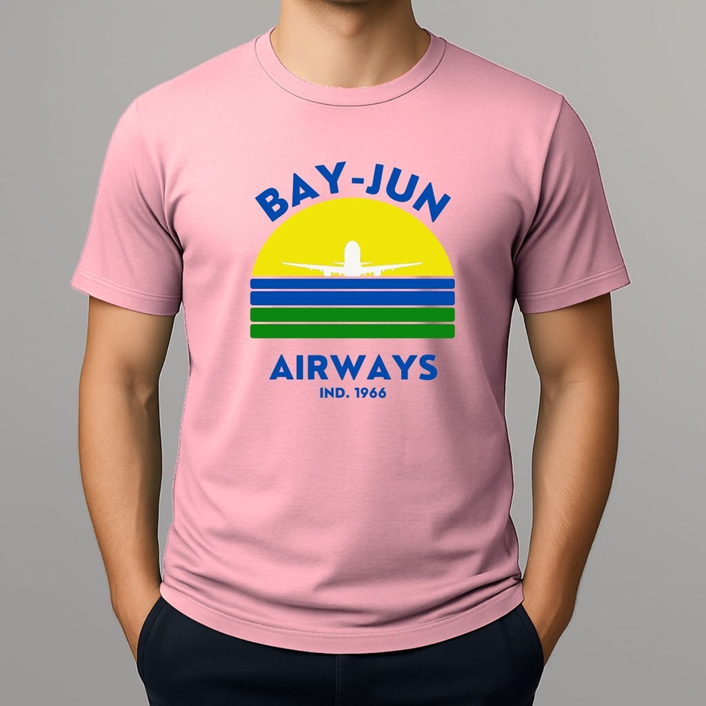 Person wearing a pink t-shirt with 'Bay-Jun Airways' design on a gray background