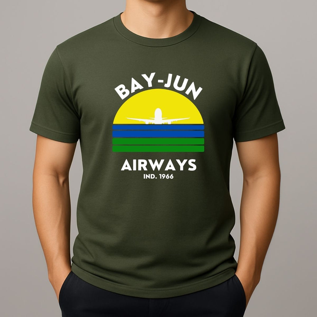 Person wearing a green t-shirt with 'BAY-JUN AIRWAYS' design on a gray background