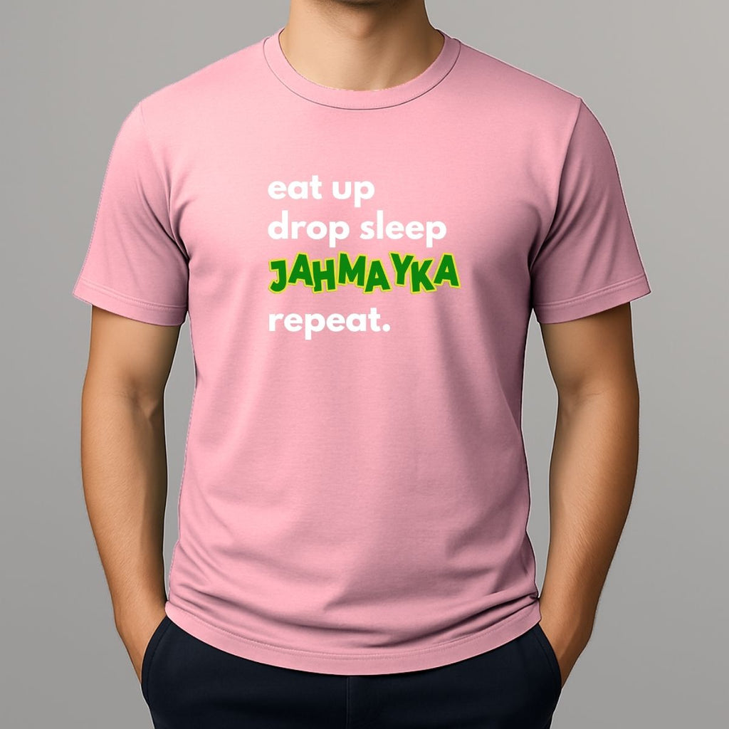 Pink t-shirt with text 'eat up drop sleep JAHMAYKA repeat.' on a gray background