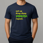 Navy t-shirt with text 'eat up drop sleep JAHMAYKA repeat.' on a gray background