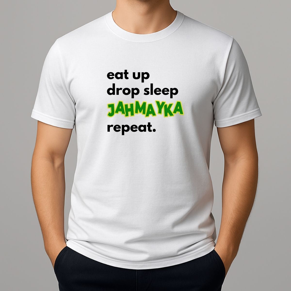 White t-shirt with text 'eat up drop sleep JAHMAYKA repeat.' on a gray background
