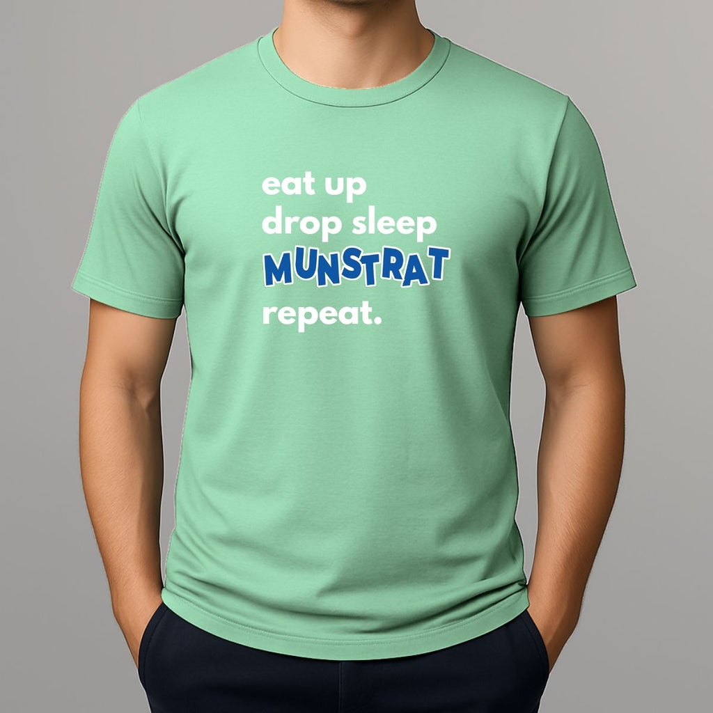 Person wearing a light green t shirt with white wnd blue text