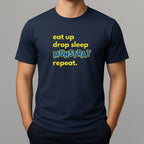 Person wearing navy t shirt with yellow text