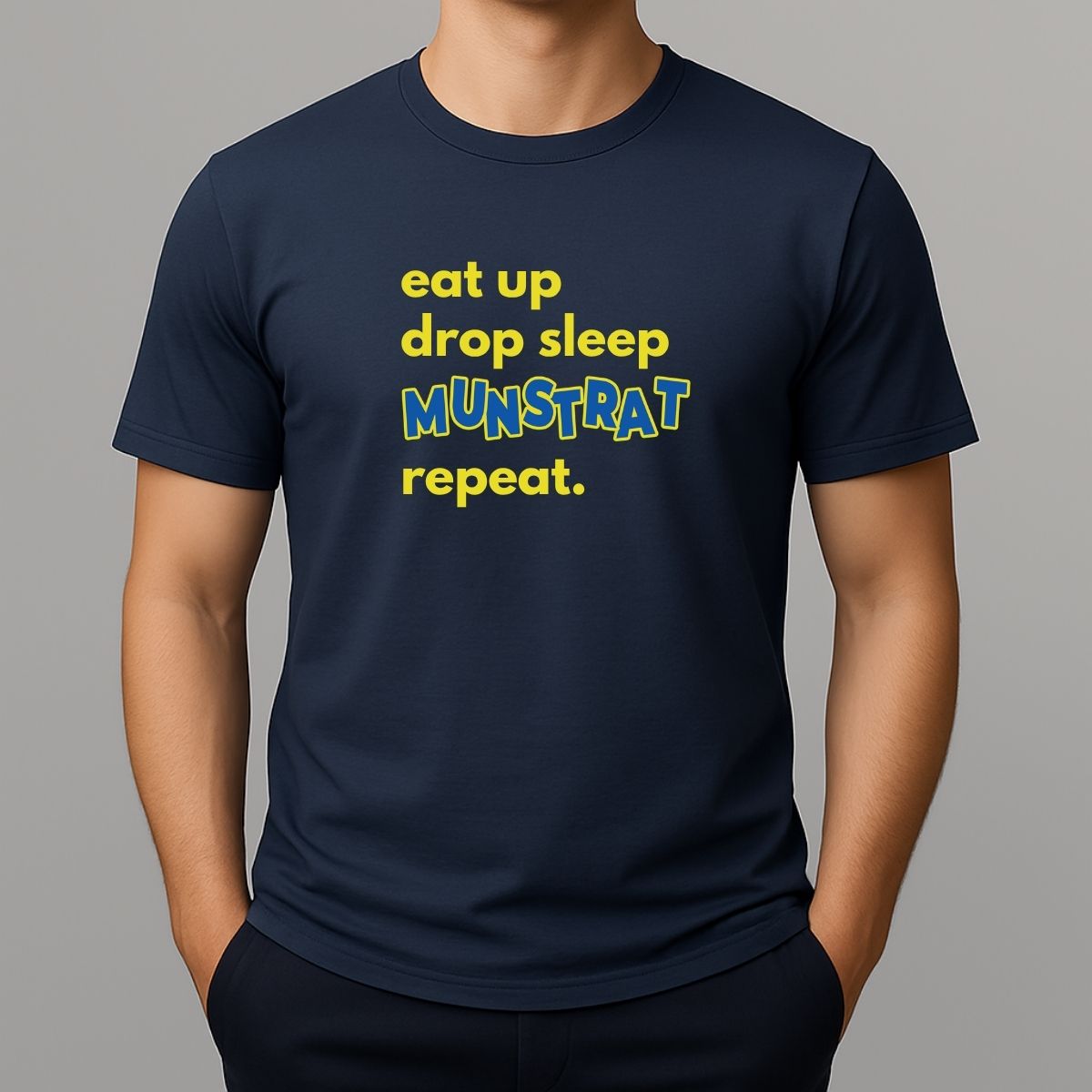 Person wearing navy t shirt with yellow text