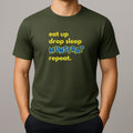 Person wearing a green t shirt with yellow text