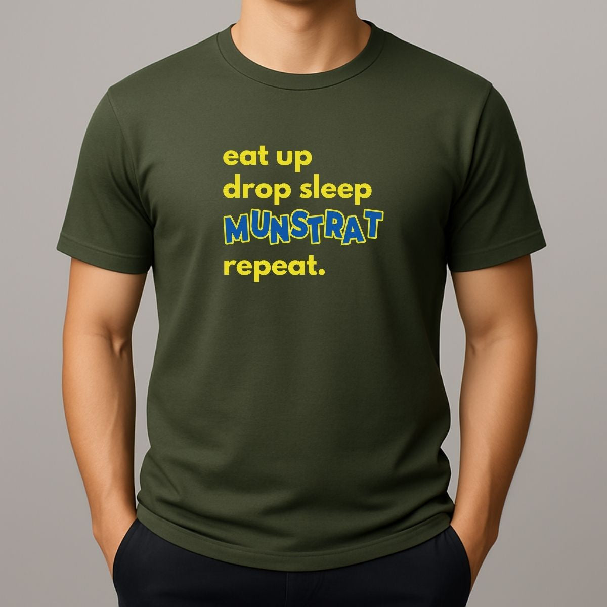 Person wearing a green t shirt with yellow text