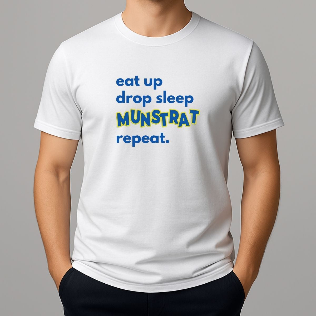 Person wearing a white t shirt with blue text