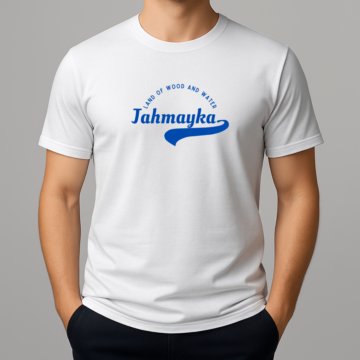Person wearing a white t-shirt with a blue graphic that phonetically spells Jamaica as 'Jahmayka' and 'LAND OF WOOD AND WATER'.