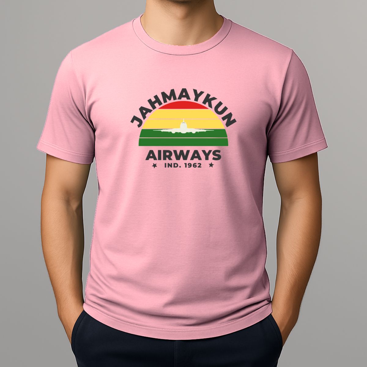 Person wearing pink t shirt with colourful JAHMAYKUN AIRWAYS graphic