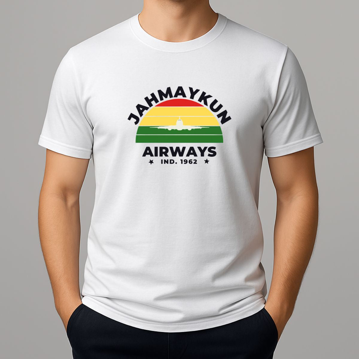 Person wearing a white t shirt with colourful Jahmaykun Airways graphic