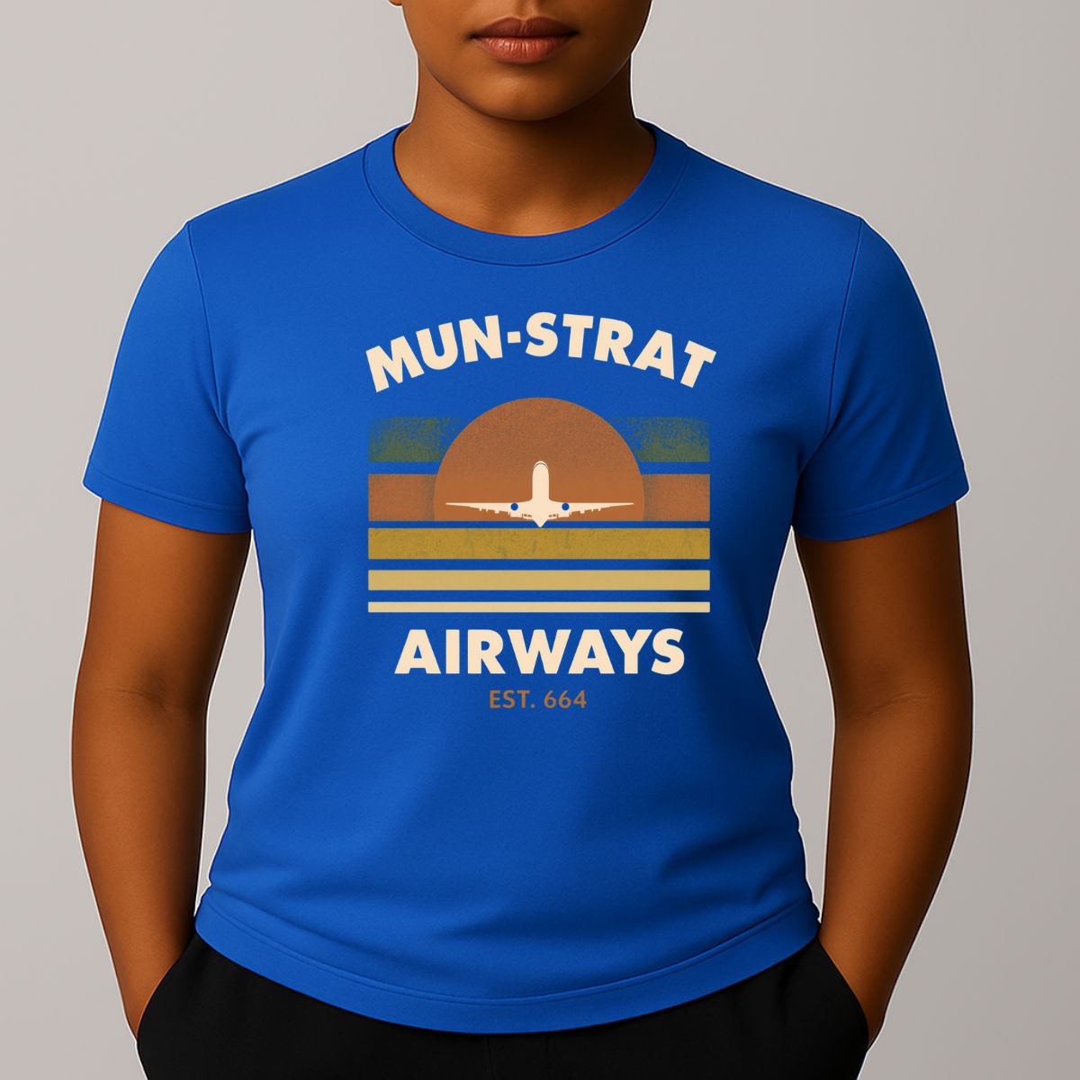 Bright blue t-shirt with 'MUN-STRAT Airways' horizon design with an airplane 