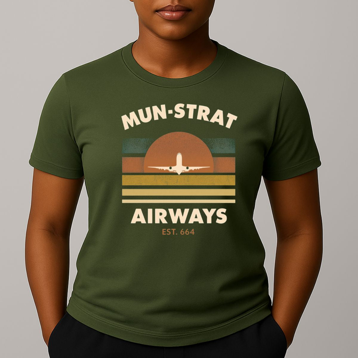 Khaki green t-shirt with 'MUN-STRAT Airways' horizon design with an airplane 