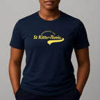Person wearing a navy short sleeve t-shirt with a yellow 'St Kitts+Nevis' graphic on the chest.