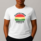 Person wearing a white t-shirt with a graphic print on the chest, featuring the text 'ST KITTS & NEVIS AIRWAYS' in black, surrounding a circular flag design with red, yellow, and green horizontal bands and a white airplane silhouette.