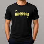 Person wearing a black t-shirt with 'BAR-BAY-D-UN' printed in yellow on a gray background