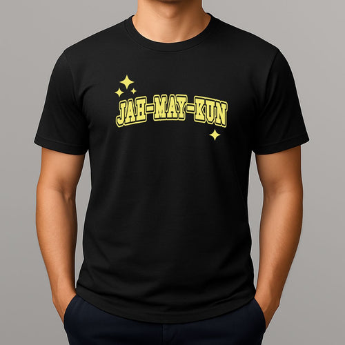 Person wearing a black t-shirt with 'JAH-MAY-KUN' printed in yellow on a gray background