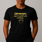 Person wearing a black t-shirt with graphic and text in yellow 'jah-may-kun'