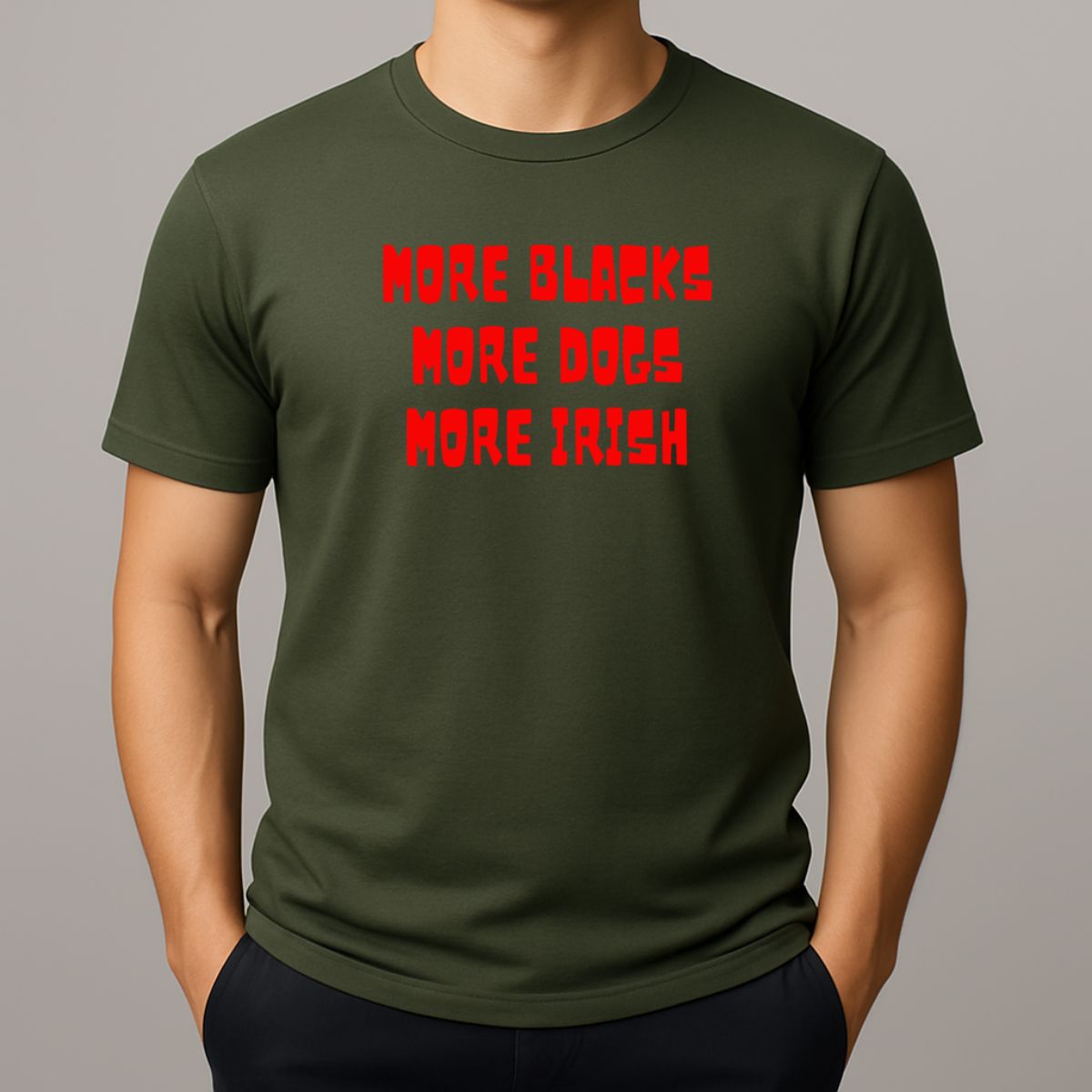 Person wearing a khaki green t-shirt with red text 'MORE BLACKS, MORE DOGS, MORE IRISH' 