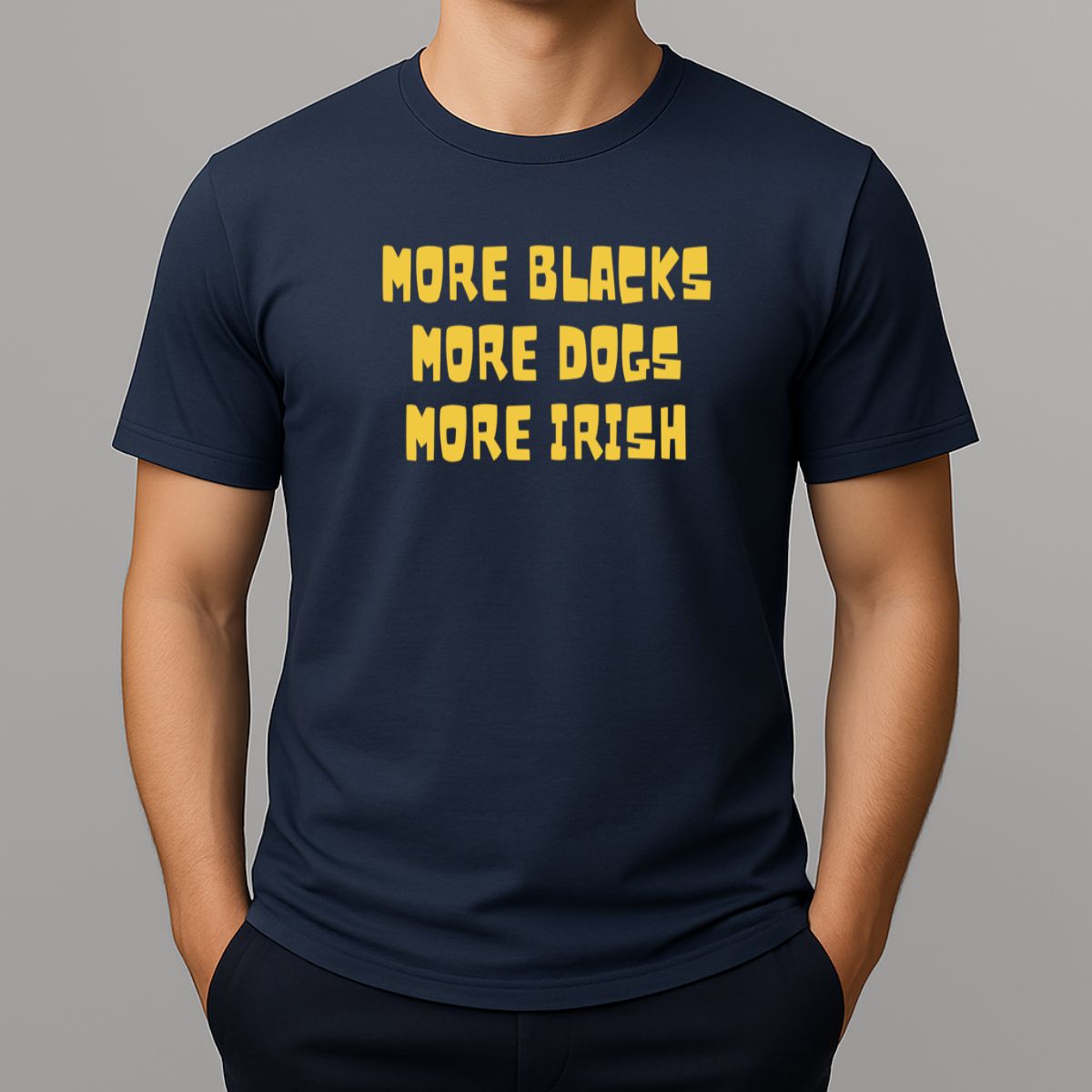 Person wearing a navy t-shirt with yellow text 'MORE BLACKS, MORE DOGS, MORE IRISH' 