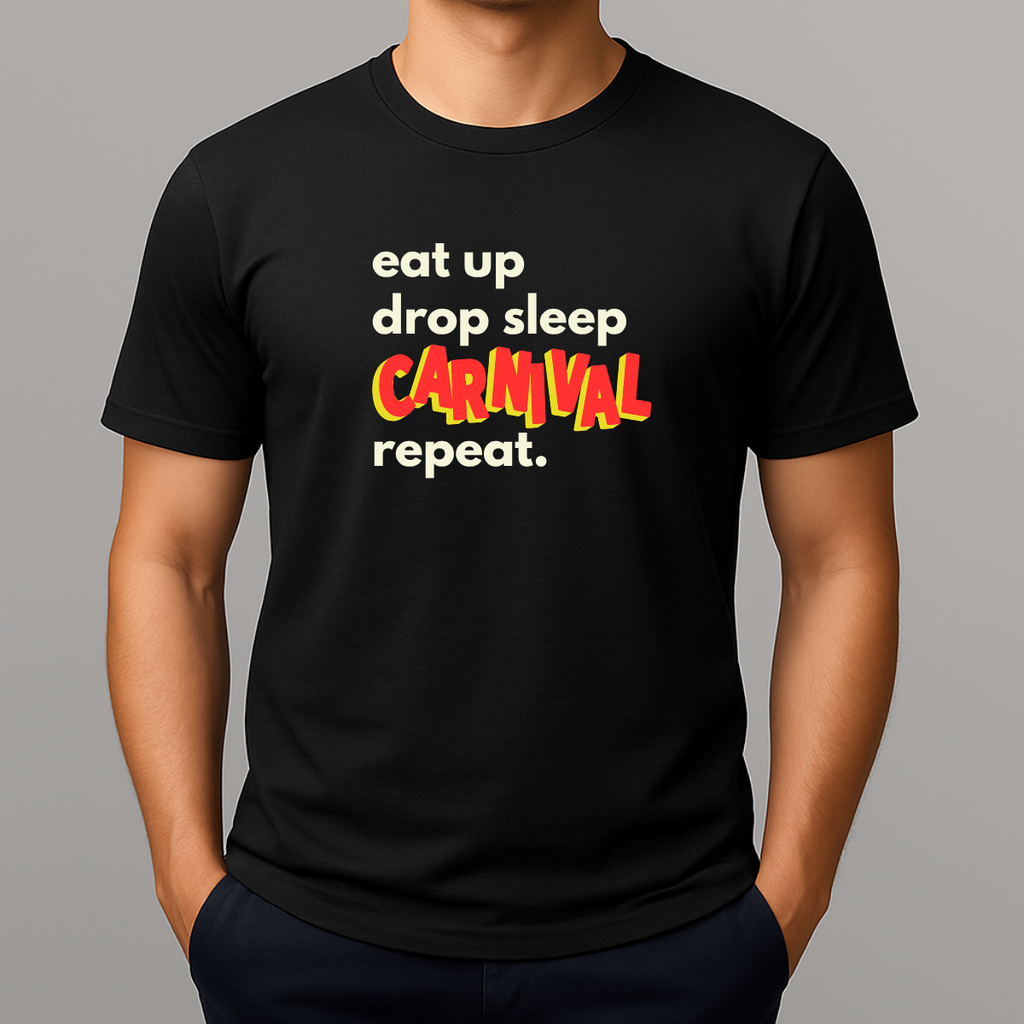 Person wearing a black t-shirt with a colorful graphic text in white, blue and red that reads 'eat up drop sleep CARNIVAL repeat.'